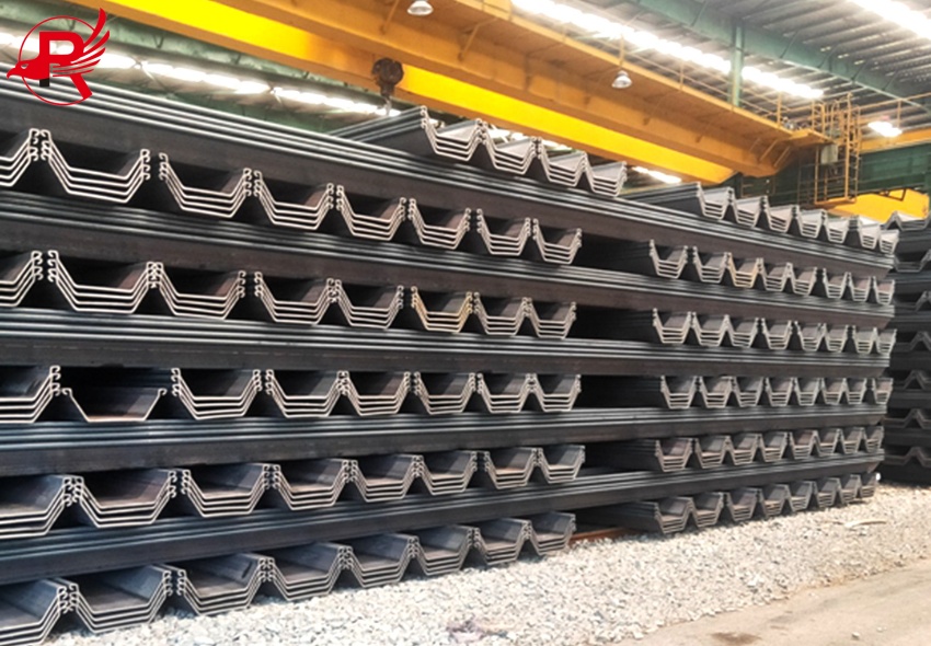 Some steel sheet piles are neatly arranged on the rack