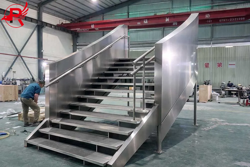 Workers are assembling modular steel stairs