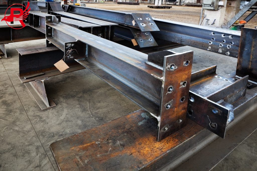 Steel structural components being welded
